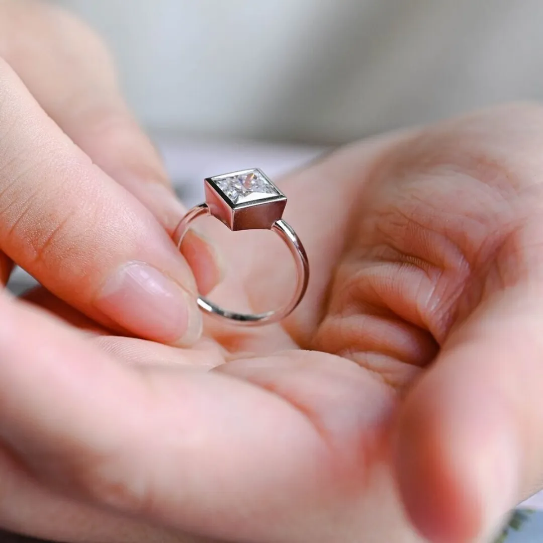 /public/photos/live/Modern Kite Set Princess Cut Moissanite Bezel Ring 700 (1).webp